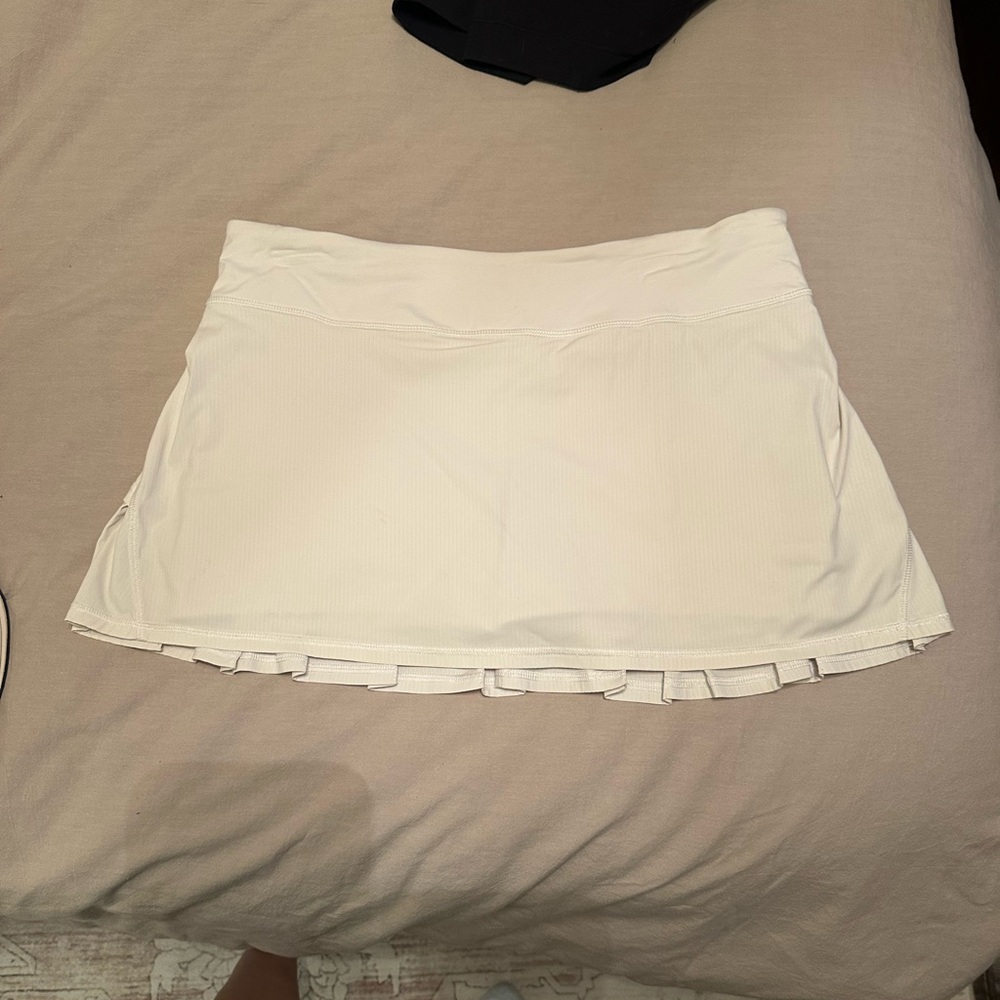 Lulu White Tennis Skirt with pleated back Ruffle Hem